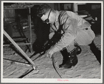 Pinal County, Arizona. Defense training project, U.S. Department of Education. Ranch boys learning welding. This man came to Arizona from Texas, learned welding, and is now working, but comes back to school at night to learn more about the subject