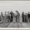 Eleven Mile Corner, Arizona. FSA (Farm Security Administration) farm workers' community. Boys learning to garden in the vocational training class. This is vocational training as provided for in the Smith-Hughes bill