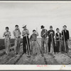 Eleven Mile Corner, Arizona. FSA (Farm Security Administration) farmworkers' community. Boys learning to garden in the vocational training class. This is vocational training as provided for in the Smith-Hughes bill