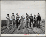 Eleven Mile Corner, Arizona. FSA (Farm Security Administration) farmworkers' community. Boys learning to garden in the vocational training class. This is vocational training as provided for in the Smith-Hughes bill