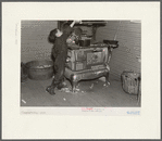 Kitchen corner of James Kelleher's house. He is a hired man living near Grand Ridge, Illinois