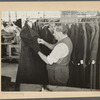The finishing touches on a woman's coat in the co-operative garment factory at Jersey Homesteads.  Hightstown, New Jersey