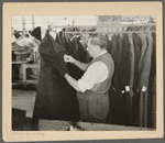 The finishing touches on a woman's coat in the co-operative garment factory at Jersey Homesteads.  Hightstown, New Jersey