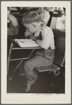 Child studying in school, Southeast Missouri Farms