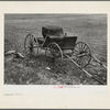 Old buggy and pitchfork on farm near Northampton, Massachusetts