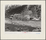 Backyards of buildings on the main street of the ghost town of Eureka, Colorado. Notice the waste dumps on mountainside, which will identify this as a mining town