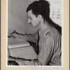 Tulare County, California. FSA (Farm Security Administration) farm workers' camp. Secretary-treasurer of the cooperative store