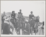 Hubert Carlin, Virginia Lee, Lisan Kay, and Yeichi Nimura riding camels in Egypt