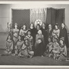 Lisan Kay, Litia Namoura, and Yeichi Nimura (back row, center) and Ruth St. Denis (seated, center) pose with dancers from St. Denis's David ballet at the Ballet Arts Center for Dance in New York City