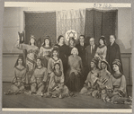 Lisan Kay, Litia Namoura, and Yeichi Nimura (back row, center) and Ruth St. Denis (seated, center) pose with dancers from St. Denis's David ballet at the Ballet Arts Center for Dance in New York City