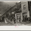 Miners turning in lamps and starting home. Capels, West Virginia