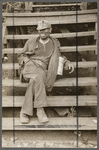 Coal miner waiting for lift home. Capels, West Virginia