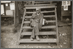 Coal miner waiting for lift home. Capels, West Virginia