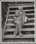 Coal miner waiting for lift home. Capels, West Virginia