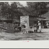 WPA (Works Progress Administration) worker's wife washing clothes in front yard. South Charleston, West Virginia