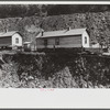 Coal miners' homes by slate and slag heap, Caples, West Virginia