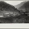 Coal miners' homes by slate and slag heap, Caples, West Virginia