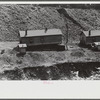 Coal miners' homes by slate and slag heap, Caples, West Virginia