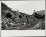 Old abandoned coke ovens with mine tipple in background, Maitland, West Virginia