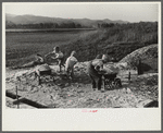 Homesteaders' children playing in pile of sand, Tygart Valley, West Virginia