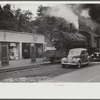 Train pulling coal through center of town morning and evenings, Osage, West Virginia