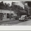 Train pulling coal through center of town morning and evenings, Osage, West Virginia
