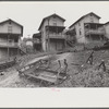 Front yard, company houses, coal mining section, Pursglove, Scotts Run, West Virginia