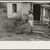 Coal miner's wife carrying water from up the hill, Bertha Hill, West Virginia