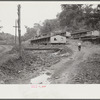 Coal miners' homes, company houses, with piles of slag and slate. "The Patch," Cassville, West Virginia