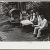 Bohemian miners (coal loaders) unemployed since mechanization of mines. Jere, West Virginia. They live together in one house with a woman housekeeper. All on relief. Spend most of their time fighting about politics