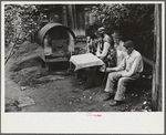 Bohemian miners (coal loaders) unemployed since mechanization of mines. Jere, West Virginia. They live together in one house with a woman housekeeper. All on relief. Spend most of their time fighting about politics