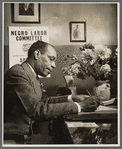 Frank Crosswaith at work in the offices of the Negro Labor Committee