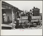 Negro day laborer moving from one man's farm to another to get work. He wasn't needed any more by former "employer." The son of his new employer said his father used to have tenants but that they "skinned" him too often by moving out on him all the time