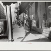 Salesgirl, fashionably dressed, Atlanta, Georgia
