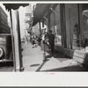 Salesgirl, fashionably dressed, Atlanta, Georgia