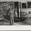 Domestic help boarding streetcar, Atlanta, Georgia