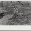 Ten year old child of George Cowley Family (rural rehabilitation client). Her bones break exceptionally easy (diet deficiency said to be one of causes) and one leg has been broken five times and doesn't mend properly. Pike County, Alabama