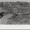 Ten year old child of George Cowley Family (rural rehabilitation client). Her bones break exceptionally easy (diet deficiency said to be one of causes) and one leg has been broken five times and doesn't mend properly. Pike County, Alabama