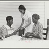 Home economics and home management class for adults under supervision of Evelyn M. Driver. Everything they make, including the hand looms, utilizes materials of local origin such as bamboo, cane, cornshucks, flour and meal and feed sacks, etc. Flint River