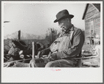 Mixed-breed Indian, white and Negro, near Pembroke Farms, making new chair seat. North Carolina