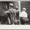 Spectators at auction sale of house and household goods, York County, Pennsylvania