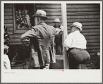 Spectators at auction sale of house and household goods, York County, Pennsylvania