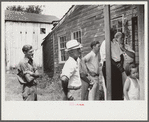 Spectators at auction sale of house and household goods, York County, Pennsylvania