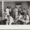 Spectators at auction sale of house and household goods, York County, Pennsylvania