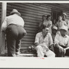 Spectators at auction sale of house and household goods, York County, Pennsylvania