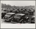 Cars parked outside the stadium at the Duke University-North Carolina game. Durham, North Carolina