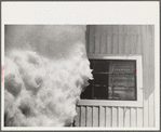 Exceptionally deep snow and sliding snow from roof almost covered the windows of many farmhouses. Woodstock, Vermont