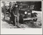 Townspeople of Woodstock, Vermont, discussing the severe winter on the street corner in center of town