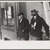 Townspeople of Woodstock, Vermont, discussing the severe winter on the street corner in center of town