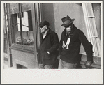 Townspeople of Woodstock, Vermont, discussing the severe winter on the street corner in center of town